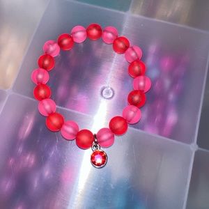 red and pink beaded bracelet